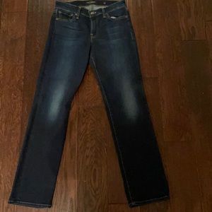 Women’s Lucky brand blue jeans.